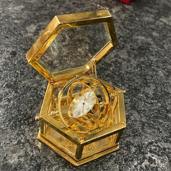 Howard Miller Polished Brass Spinning Gimbals Tabletop Clock - Picture 1 of 12